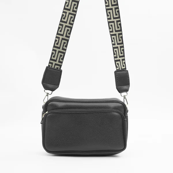 Black shoulder bag with top zip and adjustable Greek-key strap