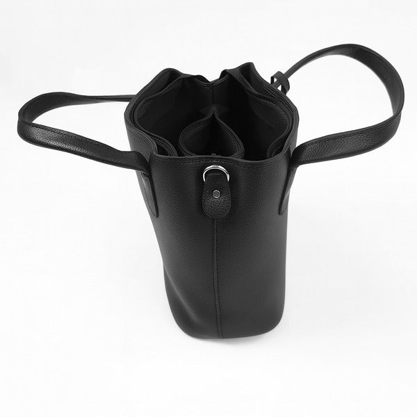 Black leather handbag with open top, interior compartments, and adjustable shoulder strap