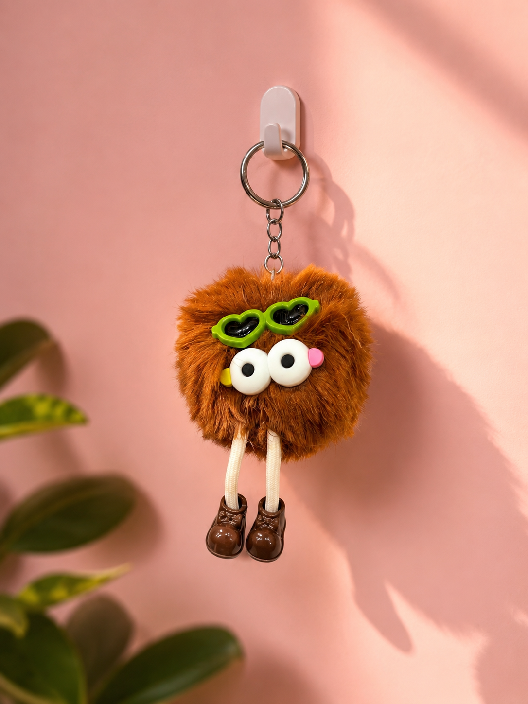 Brown plush bear heart-eye keychain with metal ring and dangling legs