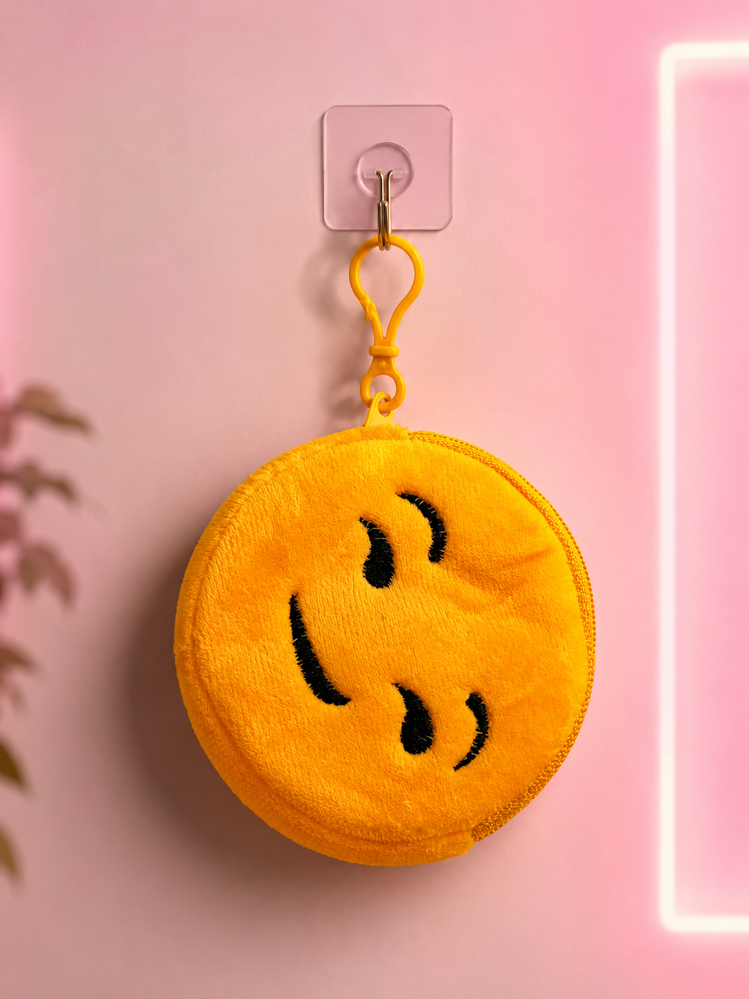 Smiley emoji plush pouch keychain with yellow round face and keyring clasp