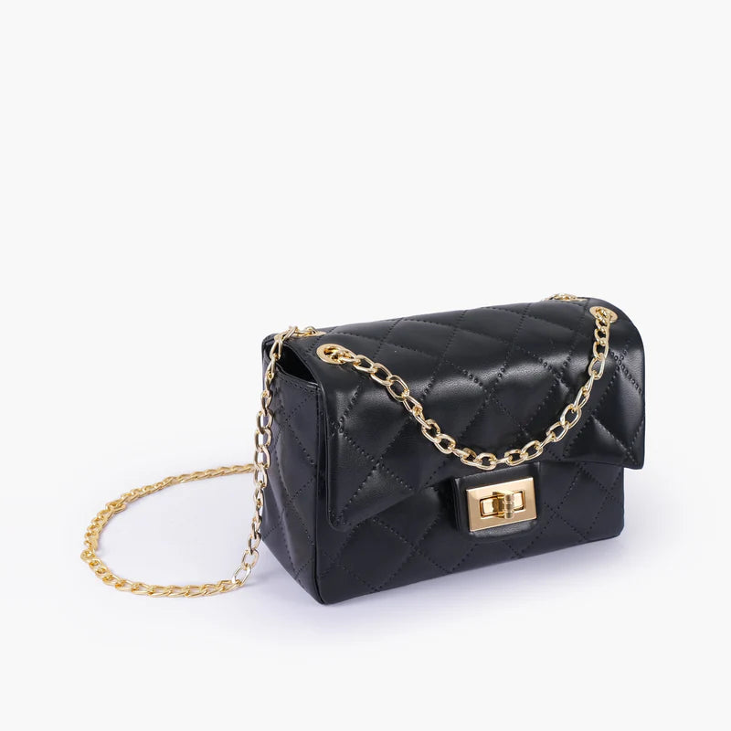 Black quilted crossbody bag with flap, gold chain strap, and gold clasp