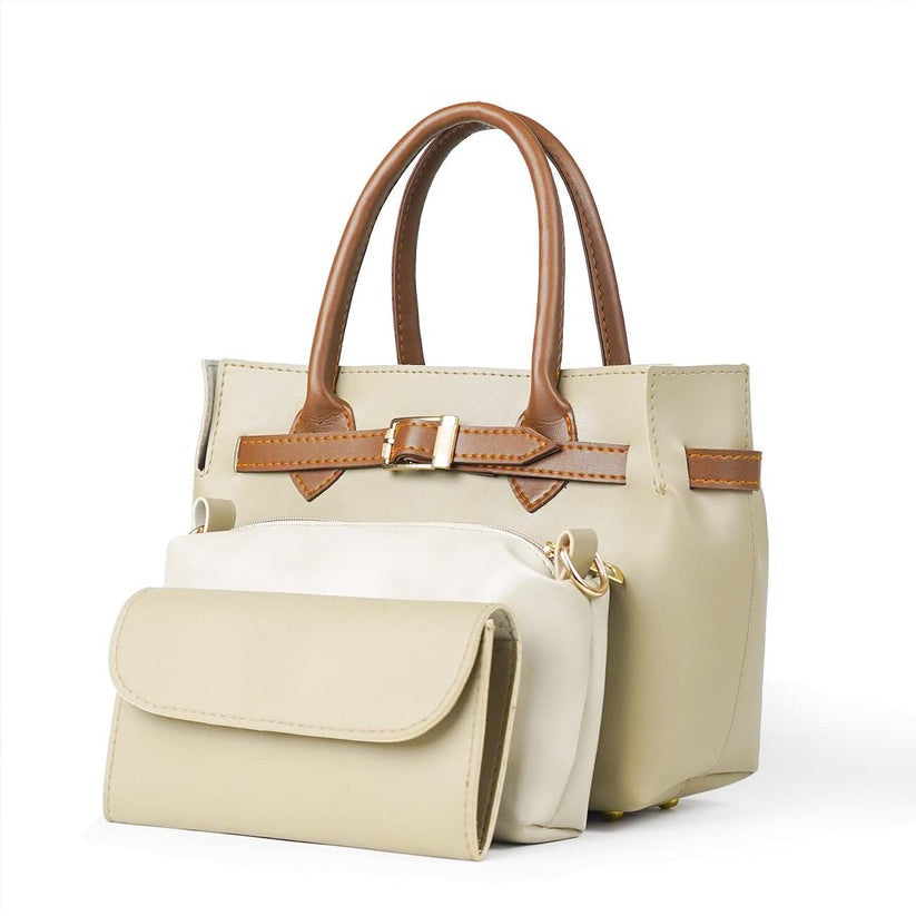 Cream tote bag with tan trim, top handles, front flap pocket, and matching pouch.
