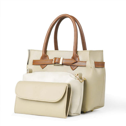 Cream tote bag with tan trim, top handles, front flap pocket, and matching pouch.