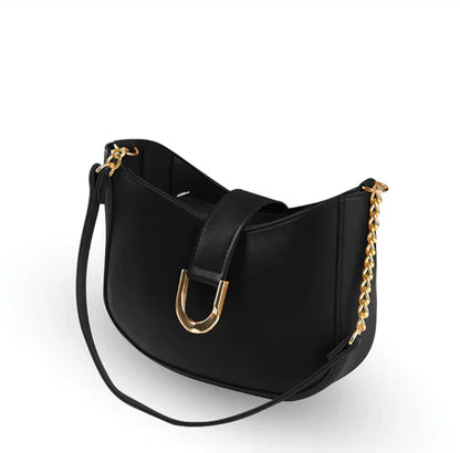 Black crescent hobo bag with gold chain crossbody strap and front buckle